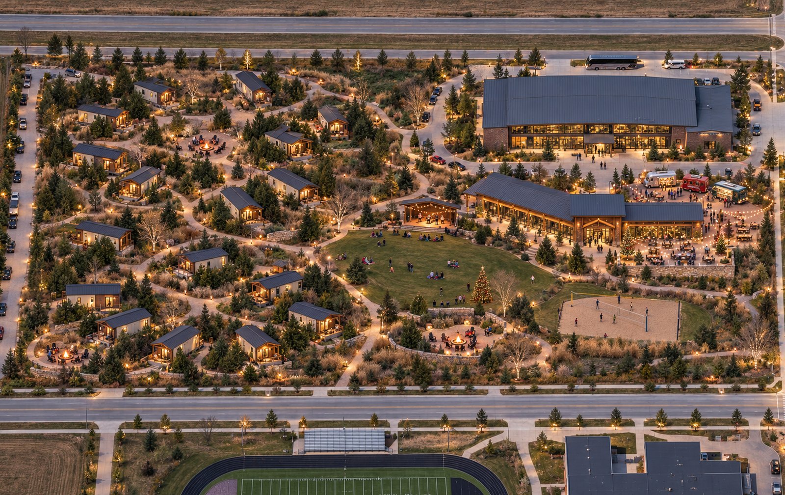 Illustrative aerial concept of a landscaped park model destination at dusk